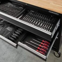 Husky 52 In W X 24.5 In. D Standard Duty 9-Drawer Workbench With 290-Piece Mechanics Tool Set In EVA Trays In Gloss Black 24 Husky 52 In W X 24.5 In. D Standard Duty 9-Drawer Workbench With 290-Piece Mechanics Tool Set In EVA Trays In Gloss Black -Husky Shop gloss black with silver trim husky mobile workbenches hotc5209b12mcmb 44 1000