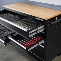 Husky 52 In W X 24.5 In. D Standard Duty 9-Drawer Workbench With 290-Piece Mechanics Tool Set In EVA Trays In Gloss Black 20 Husky 52 In W X 24.5 In. D Standard Duty 9-Drawer Workbench With 290-Piece Mechanics Tool Set In EVA Trays In Gloss Black -Husky Shop gloss black with silver trim husky mobile workbenches hotc5209b12mcmb 77 1000