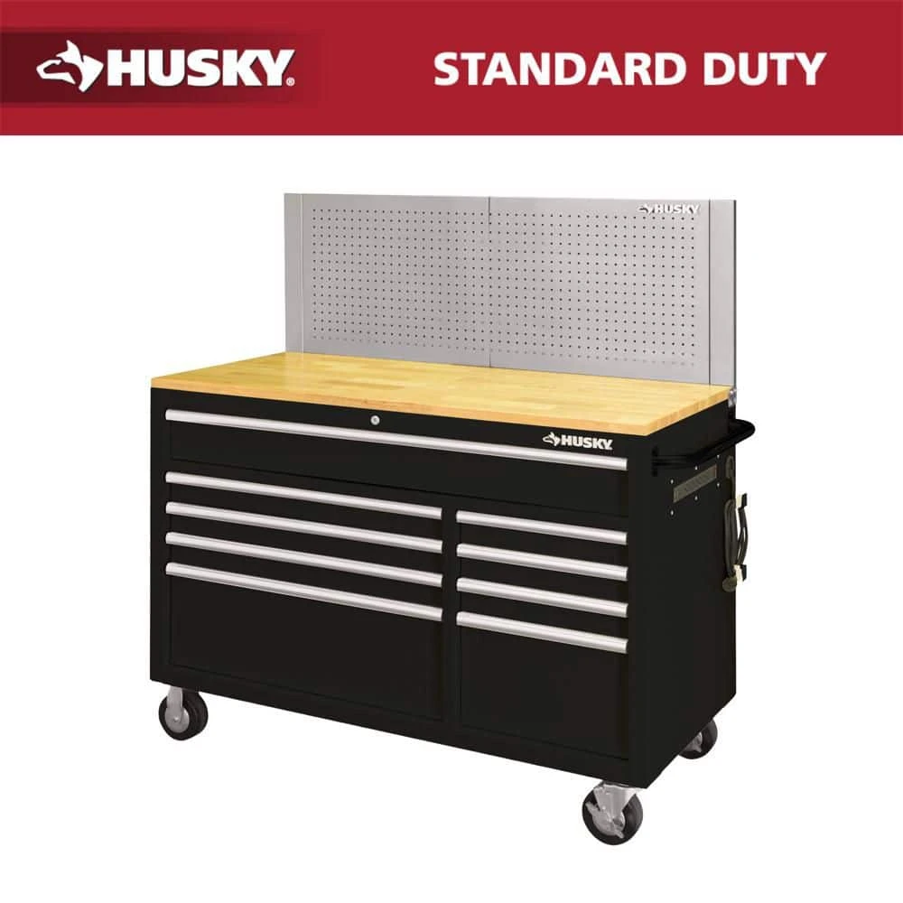 Husky 52 In. W X 24.5 In. D 9-Drawer Standard Duty Mobile Workbench Tool Chest With Solid Work Top And Pegboard In Gloss Black 1 Husky 52 In. W X 24.5 In. D 9-Drawer Standard Duty Mobile Workbench Tool Chest With Solid Work Top And Pegboard In Gloss Black