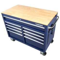 Husky 46 In. W X 24.5 In. D Standard Duty 9-Drawer Mobile Workbench Cabinet With Solid Wood Top In Gloss Blue -Husky Shop gloss blue with silver trim husky mobile workbenches h46mwc9gbv2 1d 1000