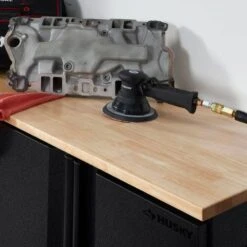 Husky Pro Duty Welded 20-Gauge Steel 2-Door Garage Base Cabinet In Black LINE-X (28 In. W X 33 In. H X 21.5 In. D) -Husky Shop husky black linex husky free standing cabinets htc1000001 lx 1d 1000